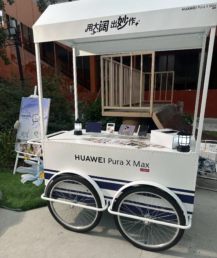 HUAWEI Pura X Max outdoor campaign using rock space AI photo sticker printer and cutter.png