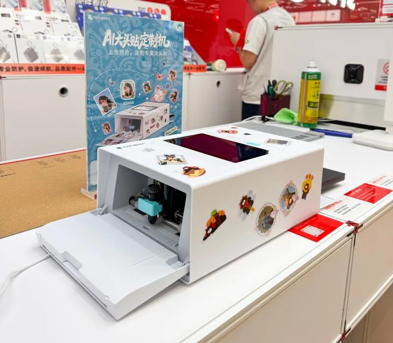 rock space AI photo sticker printer at store opening.png